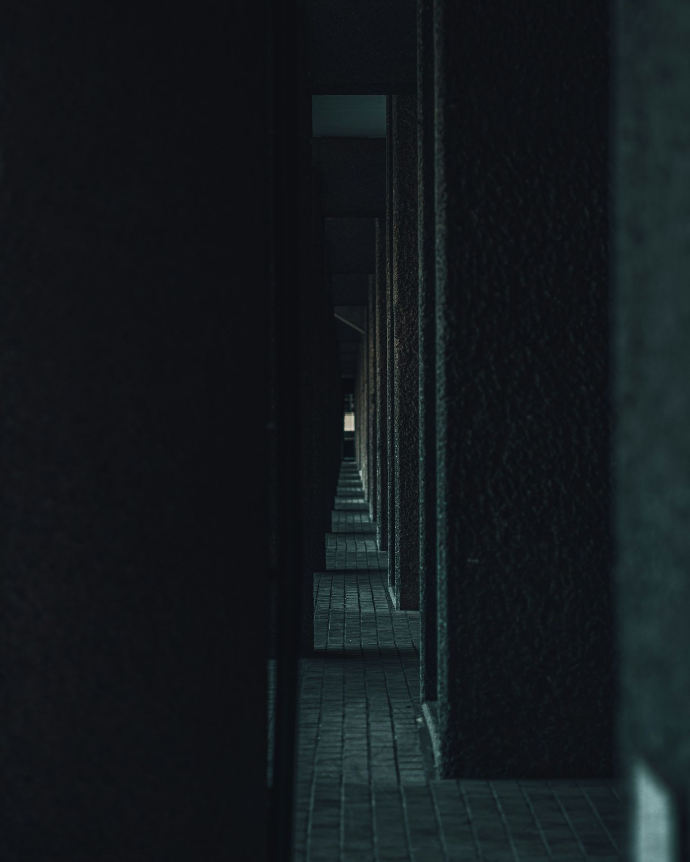 black metal staircase in a dark room